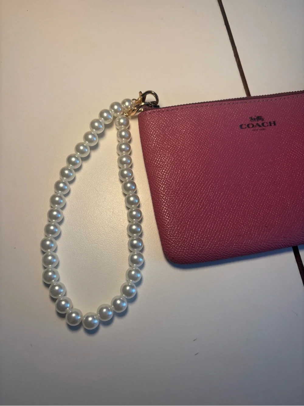 Coach Pink Pearl-Handle Zip Wristlet